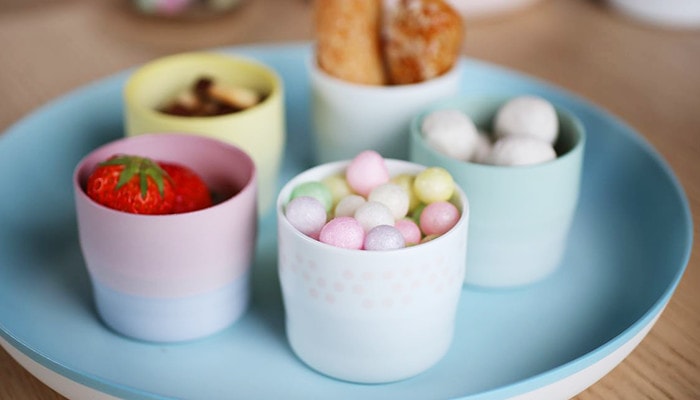 colorful espresso cup with sweets